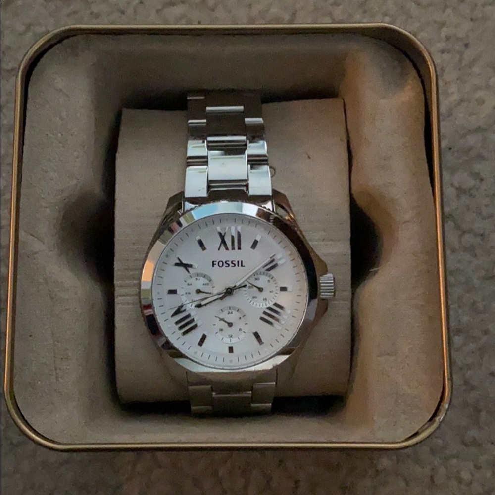 Silver fossil watch
